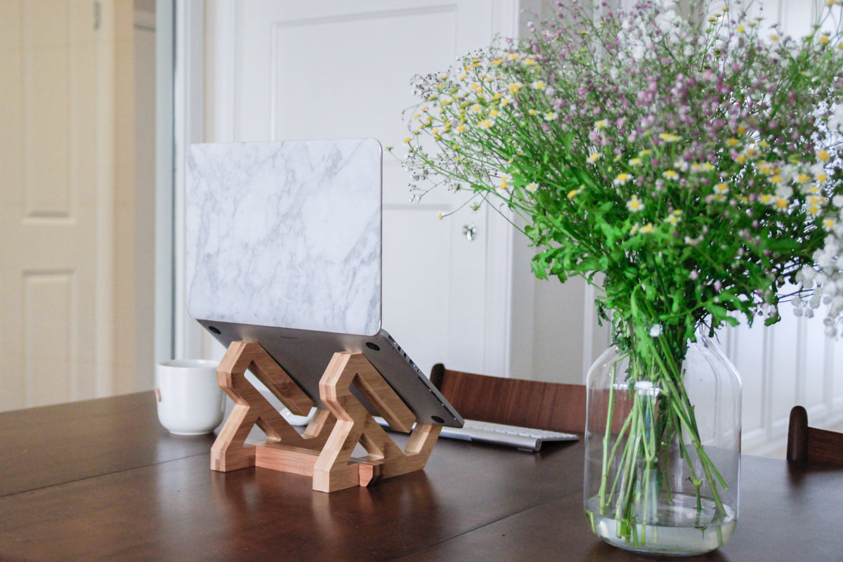 Bamboo Laptop Stand by BOTL Amsterdam on a desk
