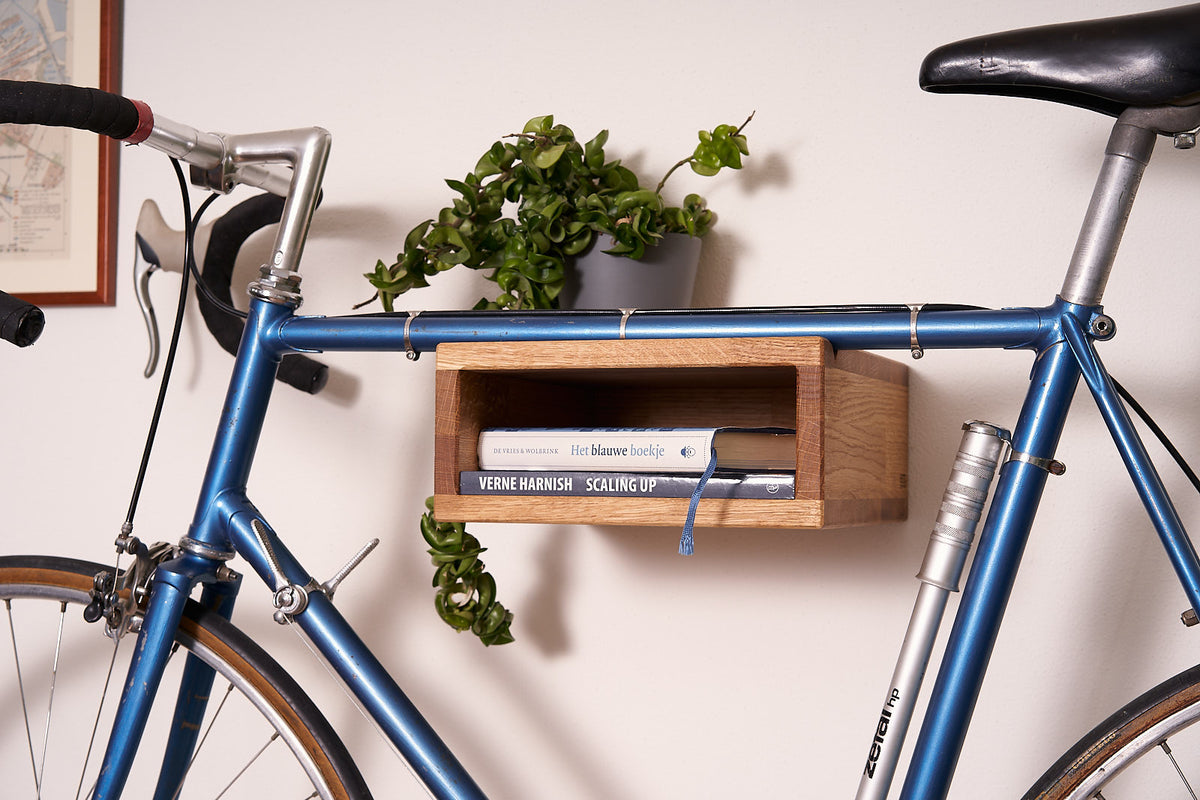 Oak Bike Wall Hanger #2 with natural oil finish, styled at home