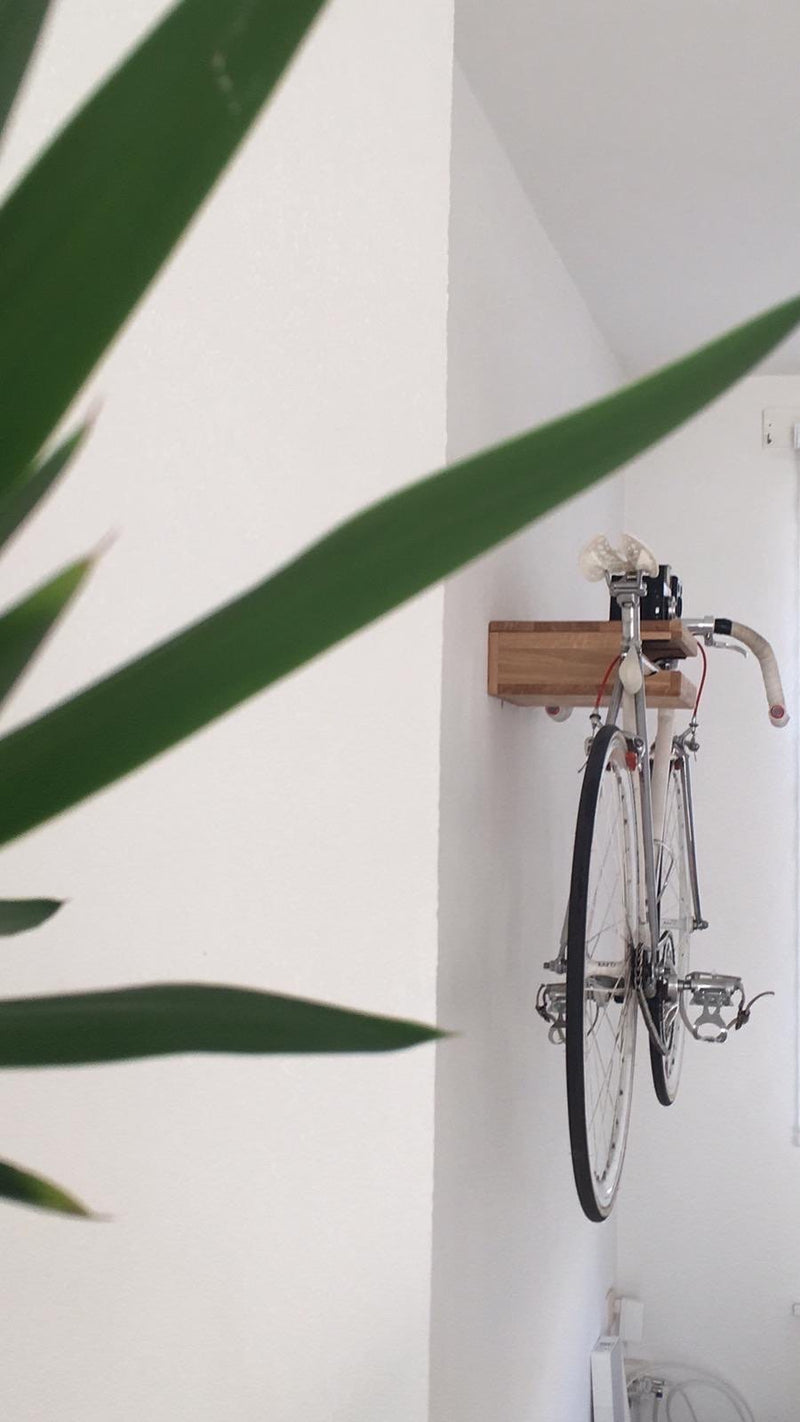Bicycle mounted on a BOTL Amsterdam bike wall mount. This is the side view. 